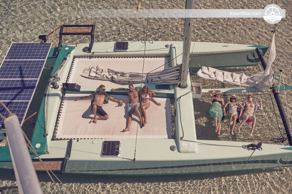 34ft catamaran crewed day sailing vacation Cala-Tarida Spain