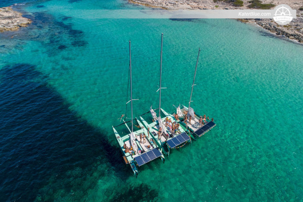 Catamaran 12-pax sailing vacation Cala-Bassa Spain