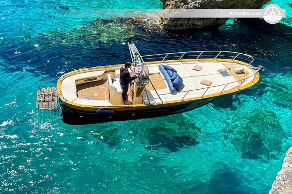 Private Capri Gozzo Charter around Blue Grotto, Green Grotto, White Grotto, Marina Piccola and Faraglioni